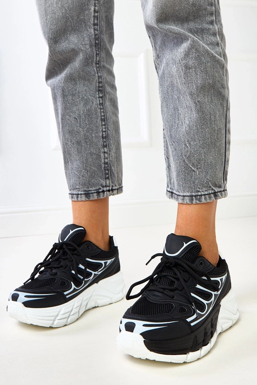 Czarne sneakersy na masywnej... Czarne sneakersy na masywnej...