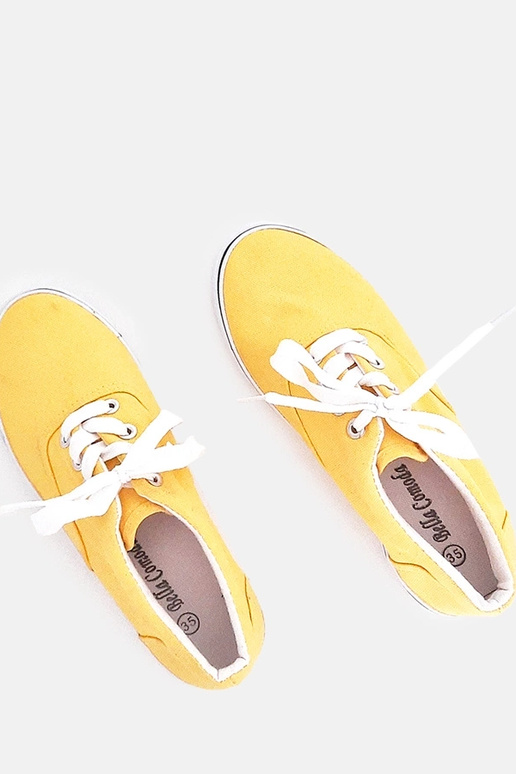 Żółte dziecięce tenisówki na...