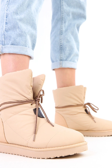 Beżowe śniegowce damskie z...