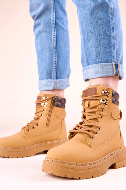 Brązowe traperki ocieplane z matowej...