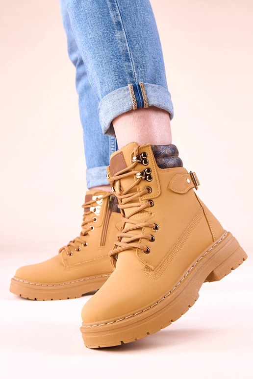 Brązowe traperki ocieplane z matowej...