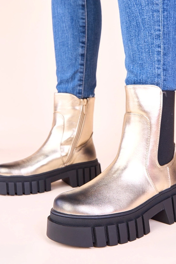 Złote botki na platformie z...