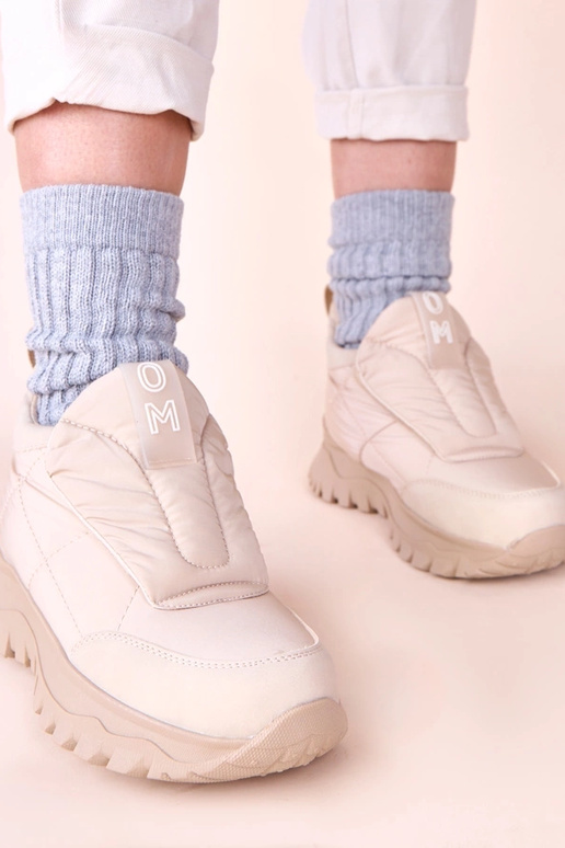 Beżowe śniegowce damskie zapinane na...