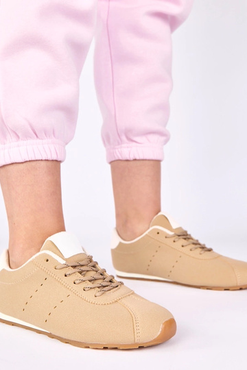 Beżowe sneakersy z białym...