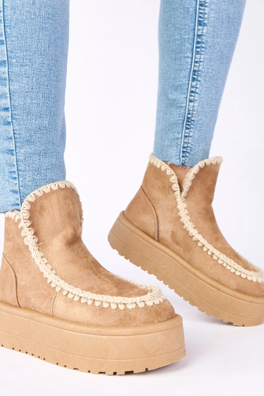 Ciemnobeżowe śniegowce na platformie...