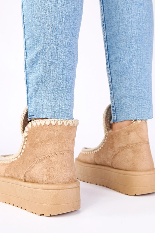 Ciemnobeżowe śniegowce na platformie...