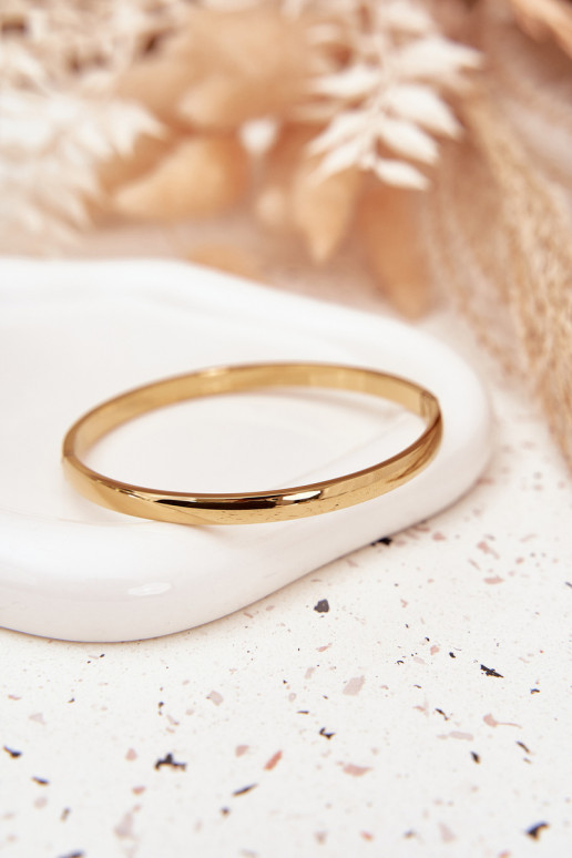 Smooth bracelet made of gold-colored surgical steel