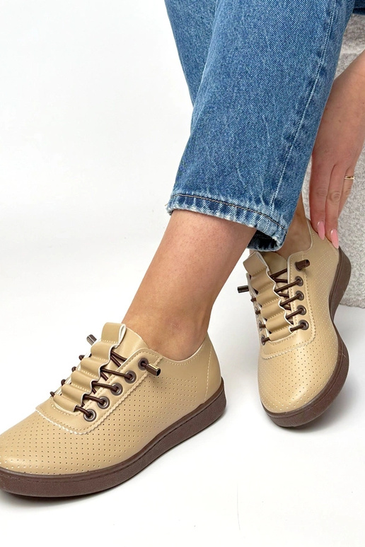 Beżowe wsuwane tenisówki perforowane...