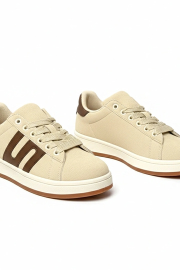 Beżowe sneakersy casualowe...