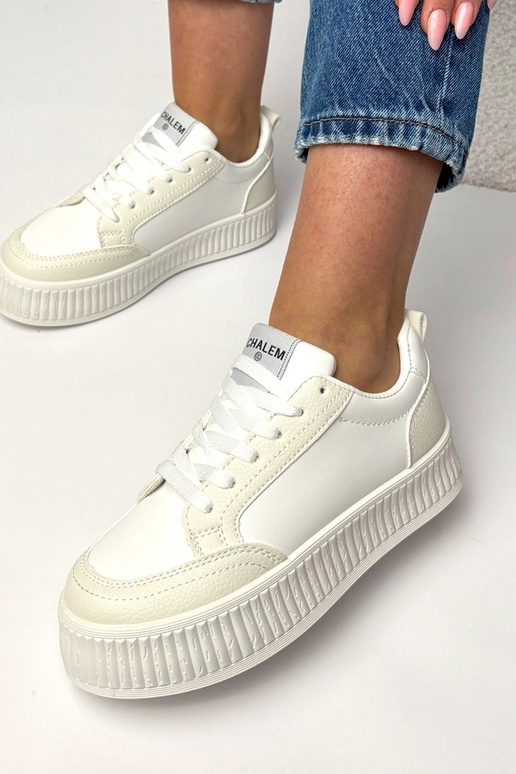 Białe sneakersy na platformie Solange