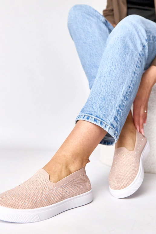 Różowe wsuwane materiałowe tenisówki...