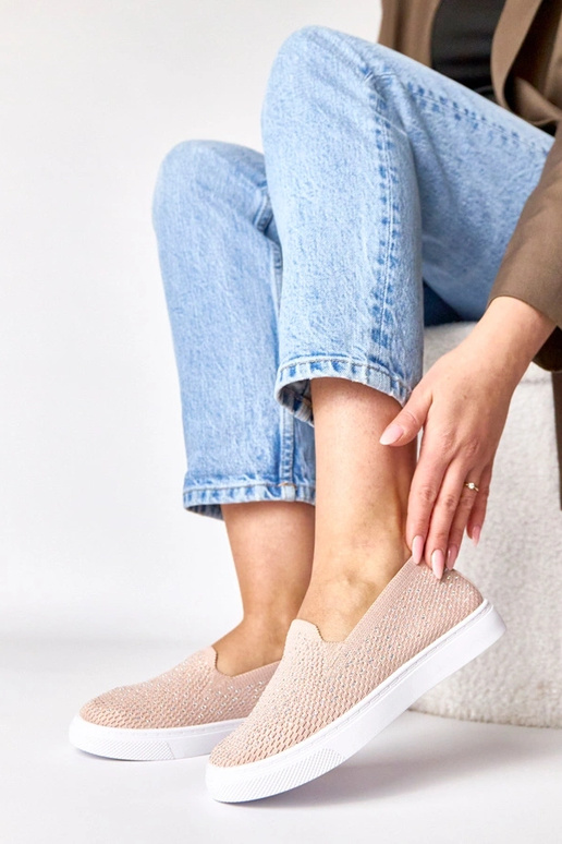 Różowe wsuwane materiałowe tenisówki...