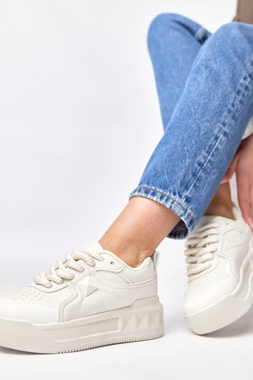 Beżowe sneakersy na platformie...