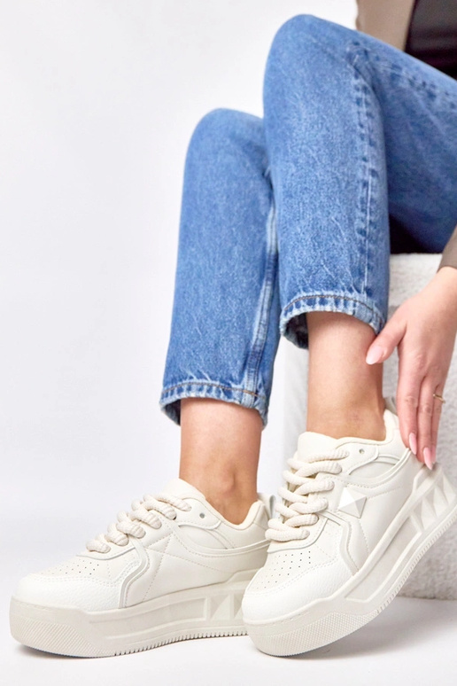 Beżowe sneakersy na platformie...