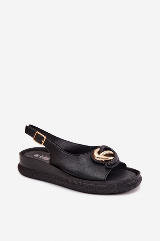 Leather platform sandals with ornaments in black color