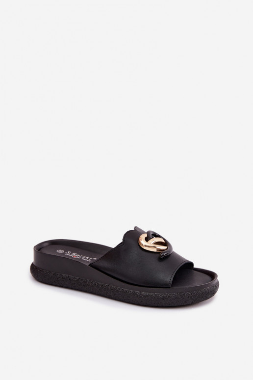 Leather slippers with decorative details in black color