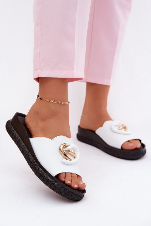 Leather slippers with decorative details in white color