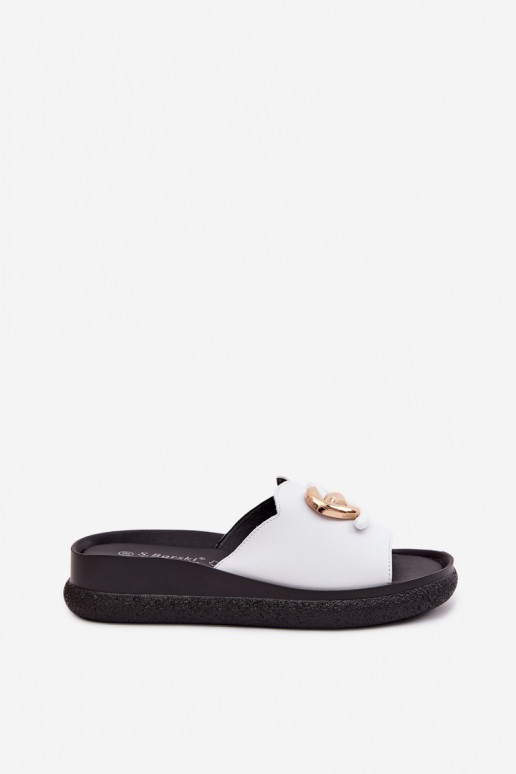 Leather slippers with decorative details in white color
