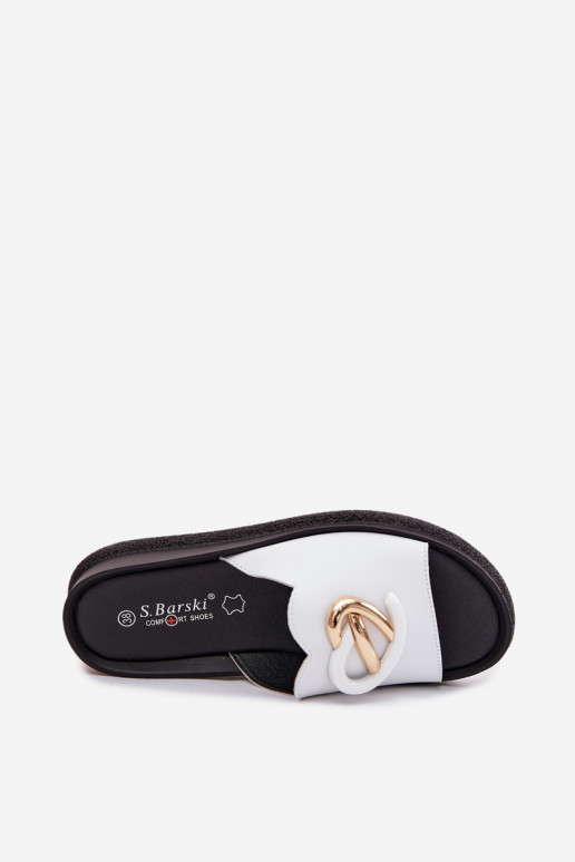 Leather slippers with decorative details in white color