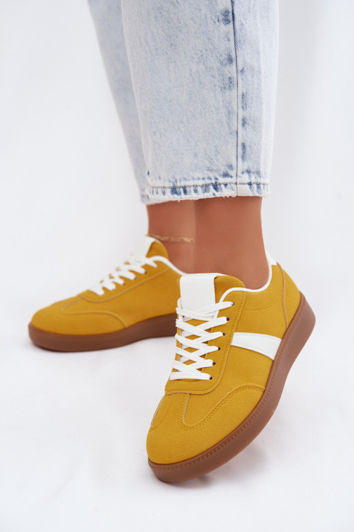 Sneakery z imitacją sztucznego zamszu w kolorze żółtym Calira