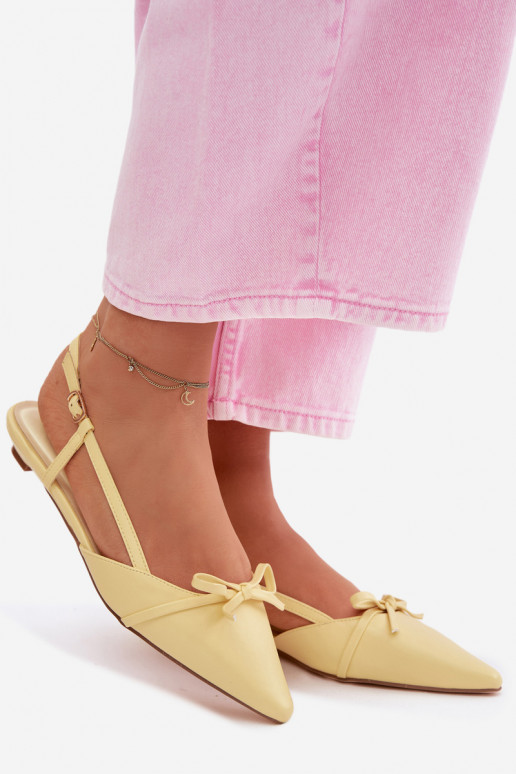 Yellow women's sandals made of faux leather on a low heel Jelmera