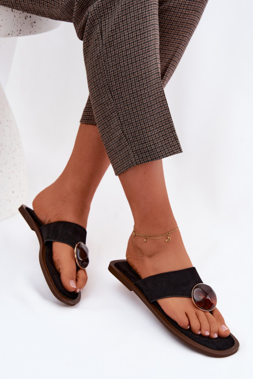 Black flat slippers with faux suede ornaments Selvessa