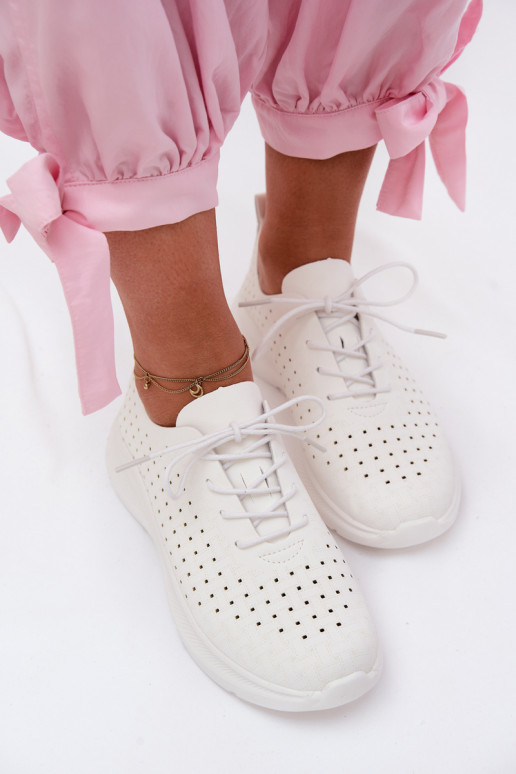 Lace-up sporty shoes for women in white color Heressa
