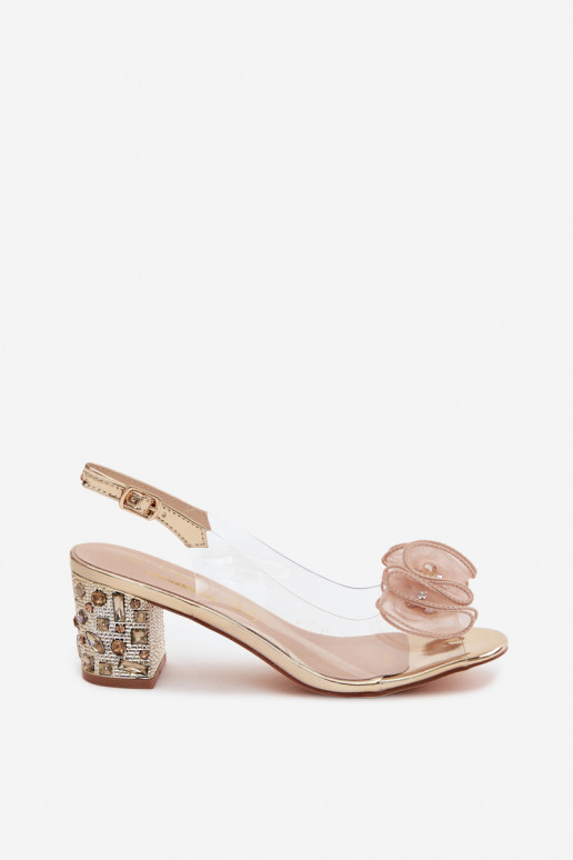 Transparent heeled sandals with sparkling gems in gold