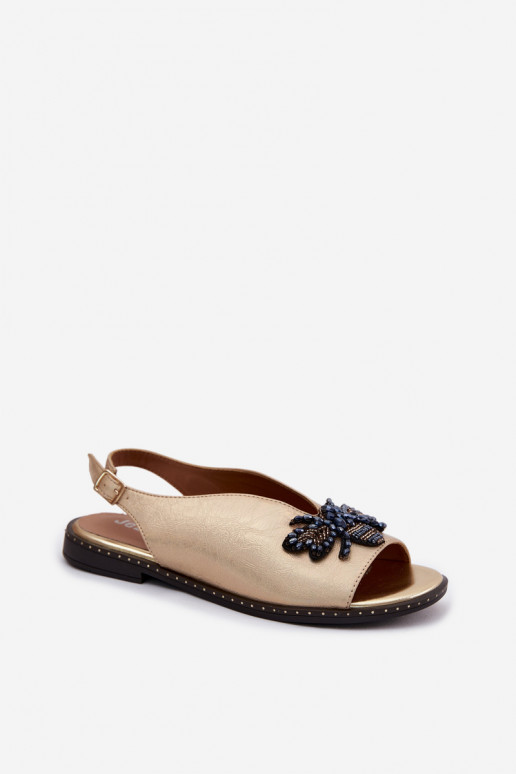 Sandals with shine and ornaments in flat gold Russona