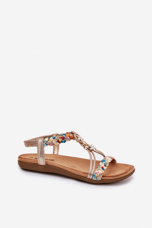 Flat women's sandals with braided straps in gold Artiker 54C1323