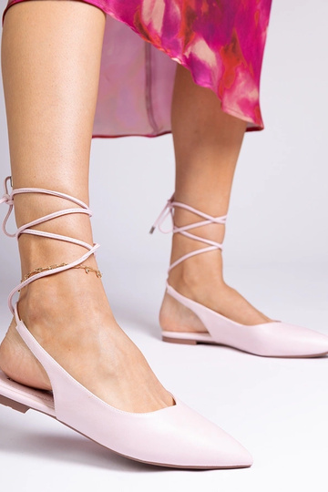 Pink flat heel mules made of faux leather Terry