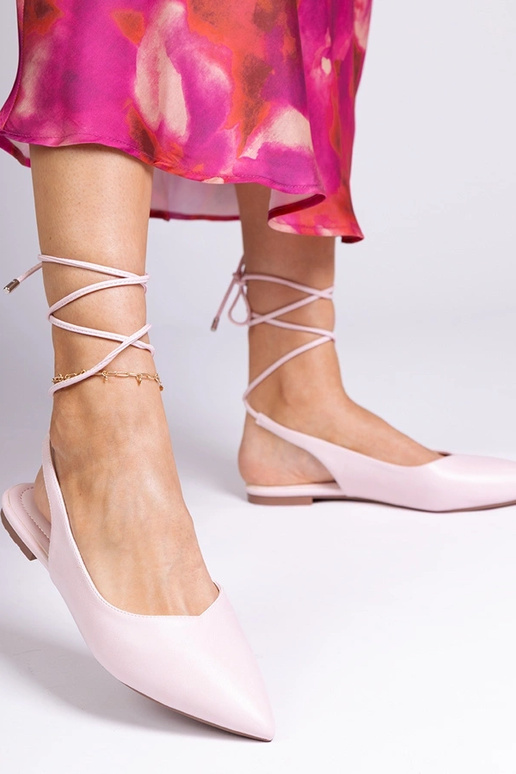 Pink flat heel mules made of faux leather Terry