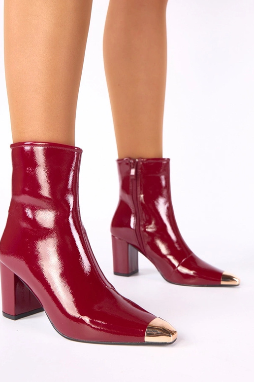Burgundy patent ankle boots with a golden toe Marilyn