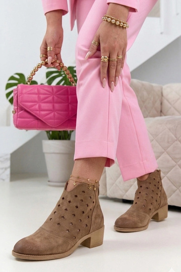 Sand-colored lace-up ankle boots on a pedestal Potocki