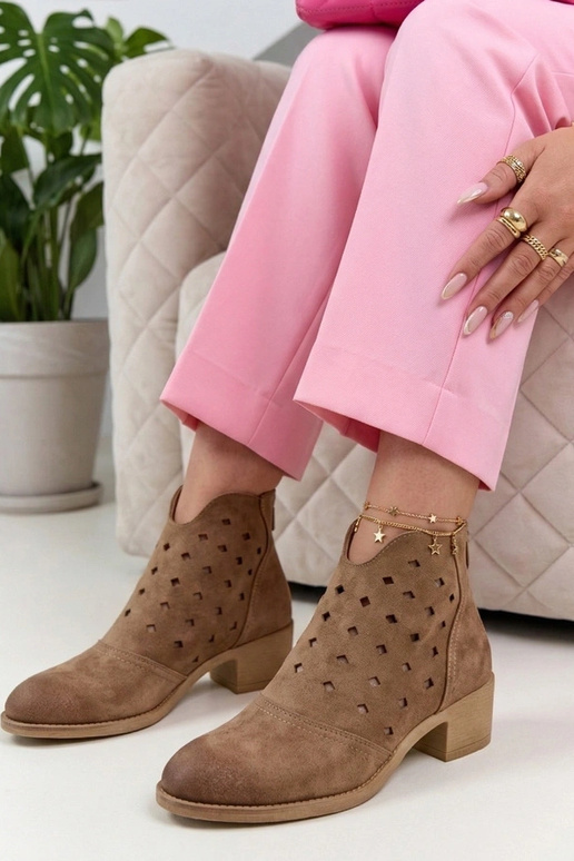 Sand-colored lace-up ankle boots on a pedestal Potocki