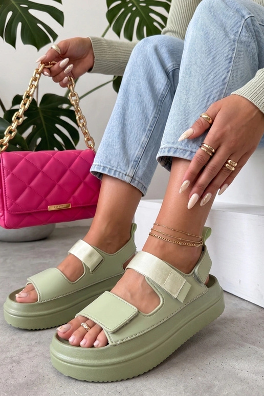 Green sandals with stickers on a high sole Davina