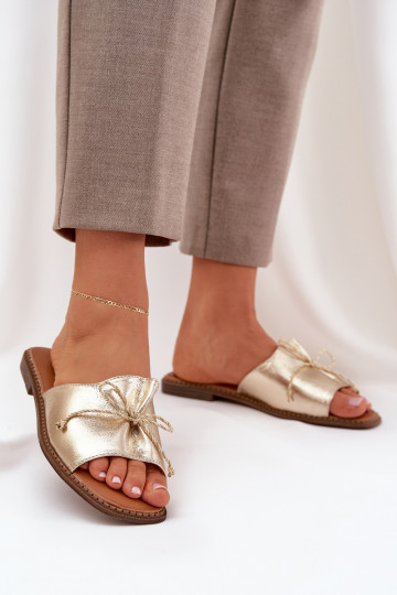 Gold flat slippers with decorative bow Deonelis