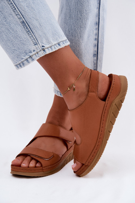 Brown women's sandals with platform and sticky fastenings