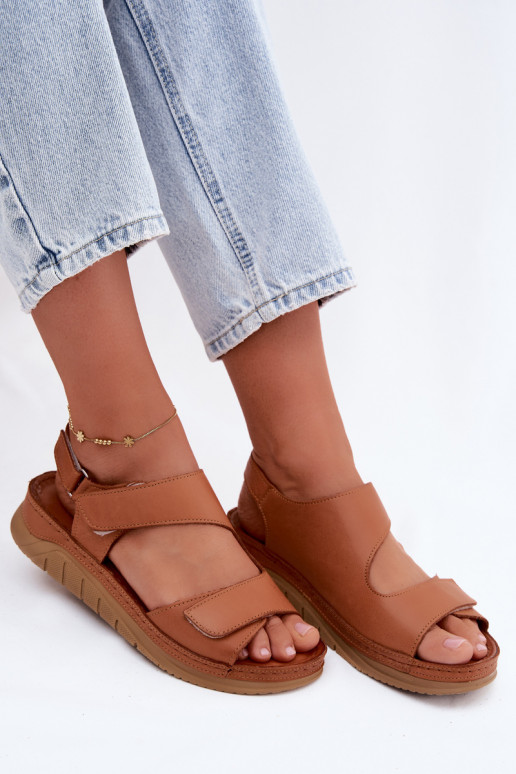 Brown women's sandals with platform and sticky fastenings