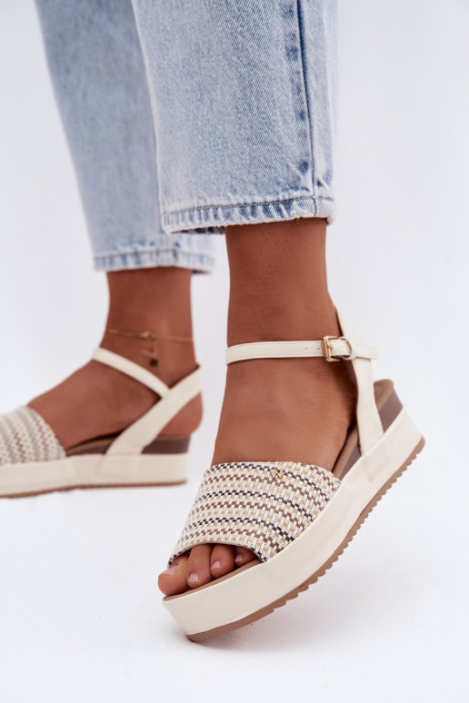 Ivory women's sandals with platform