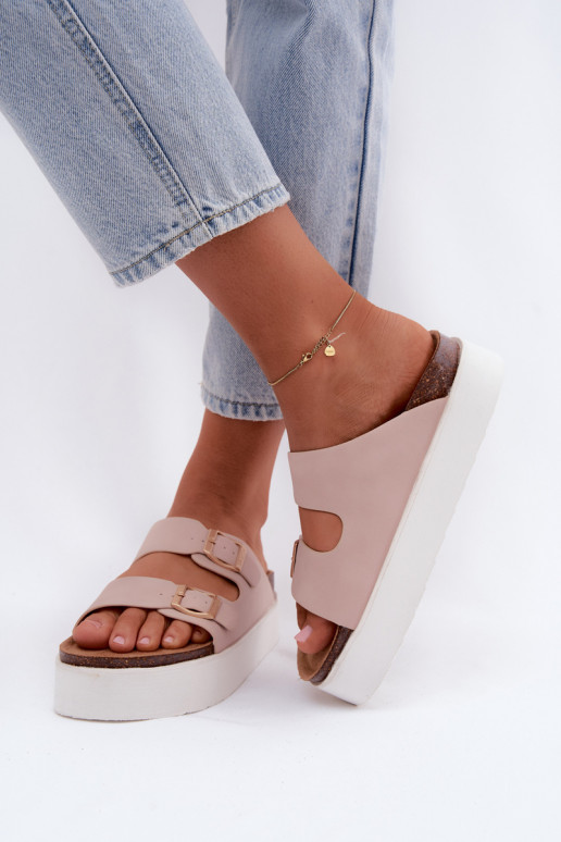 Pink women's slippers with platform and buckles