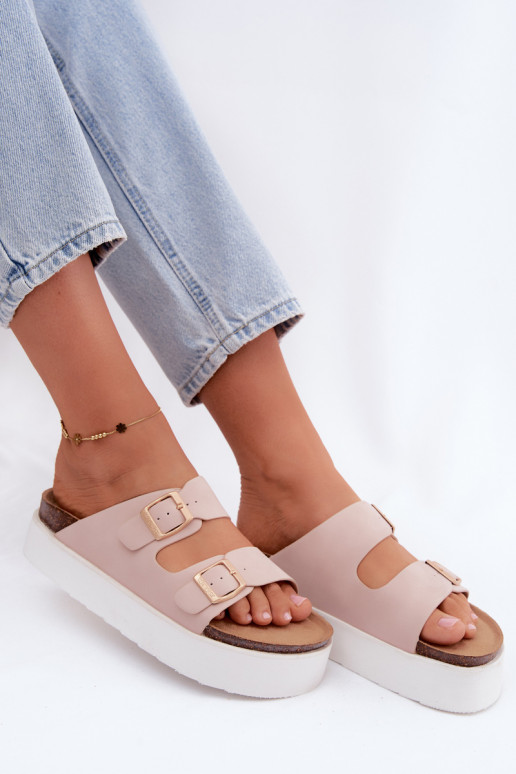 Pink women's slippers with platform and buckles