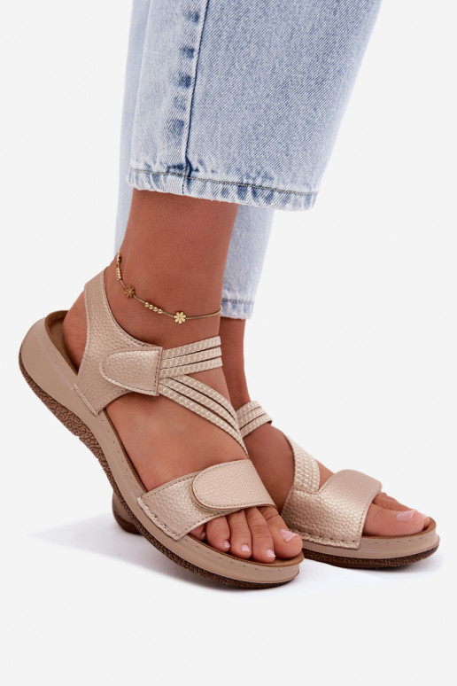 Gold women's sandals with elastic straps