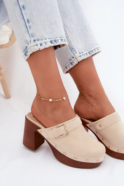 Sand-colored women's clogs with heels, buckles, and studs Lagunelle
