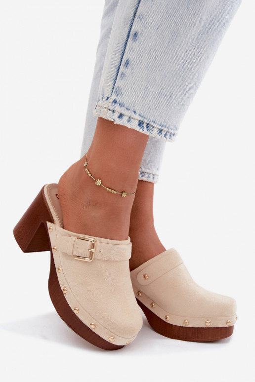 Sand-colored women's clogs with heels, buckles, and studs Lagunelle