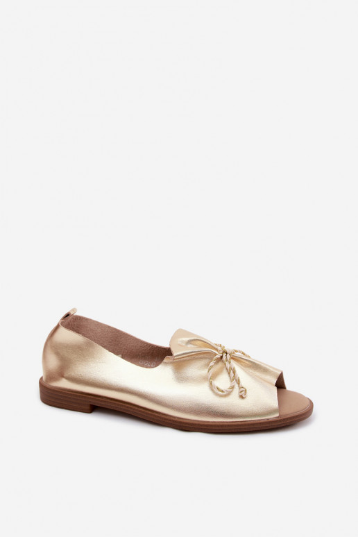 Golden women's sandals with decorative laces and shiny finish made of faux leather Coltrania