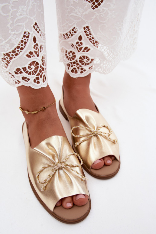 Golden women's sandals with decorative laces and shiny finish made of faux leather Coltrania