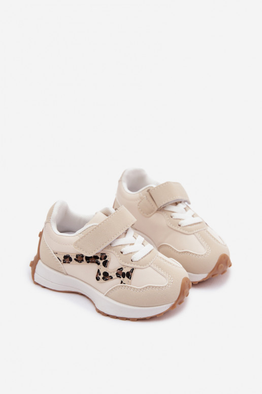 Dziecięce sportowe buty z rzepami i wzorem w panterkę w kolorze piaskowym Cosima