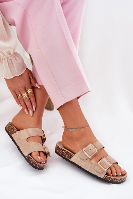 Women's slippers with buckles on a cork sole in sand with hearts