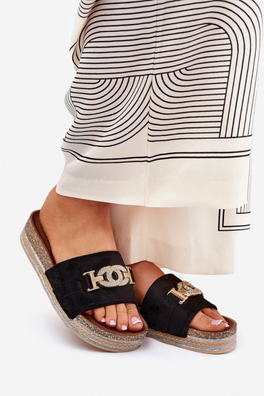 Women's slippers with details on a platform with shine in black Eanes